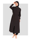 Woman in black full-length burkini with zipper and head covering.