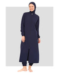 Woman in navy full-length burkini set with zipper, front view.