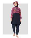 Navy and red coral print burkini set front view on model.