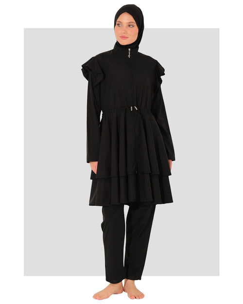 Black ruffle burkini set front view on model with hijab.
