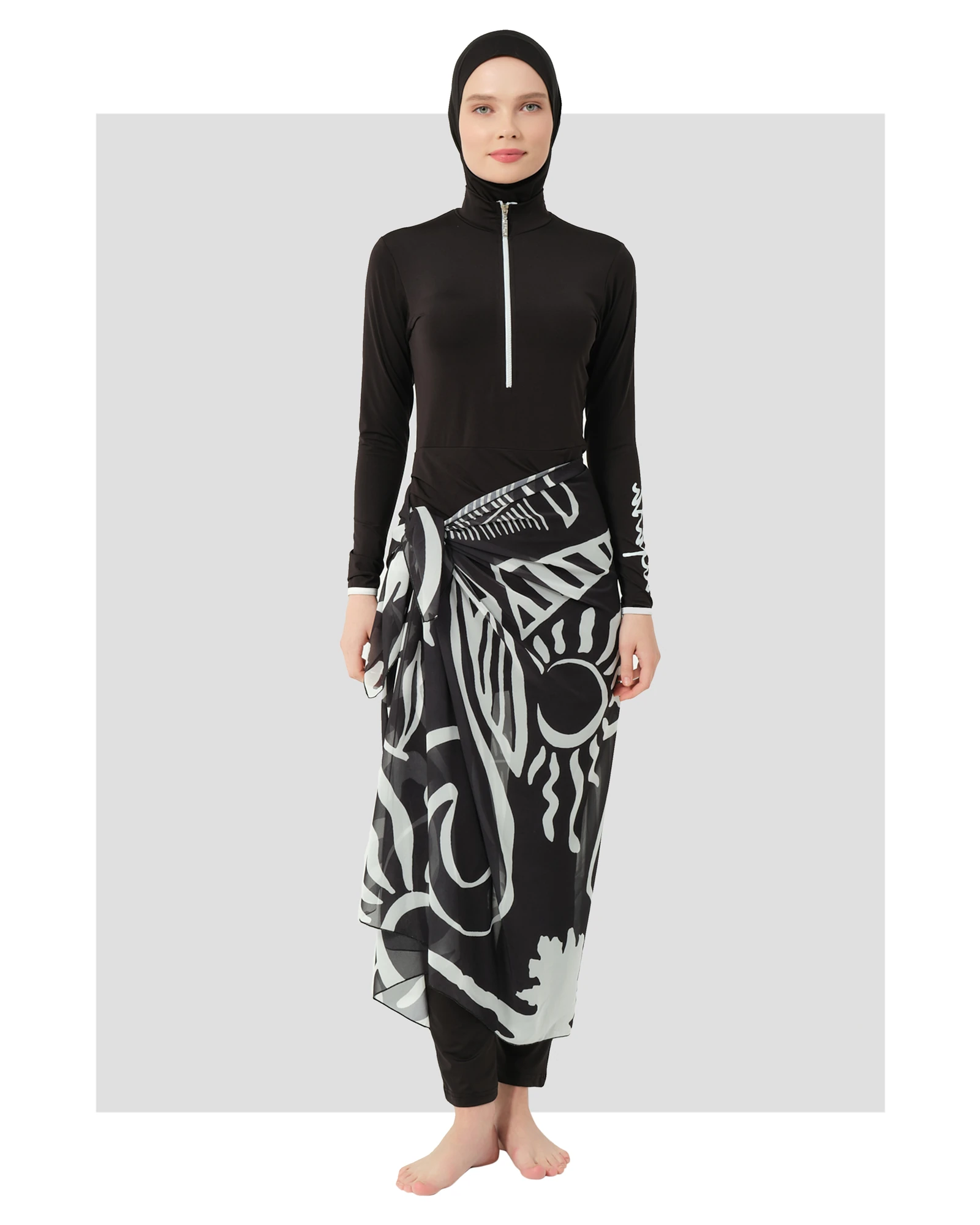 Black burkini set with printed sarong, front view on white background