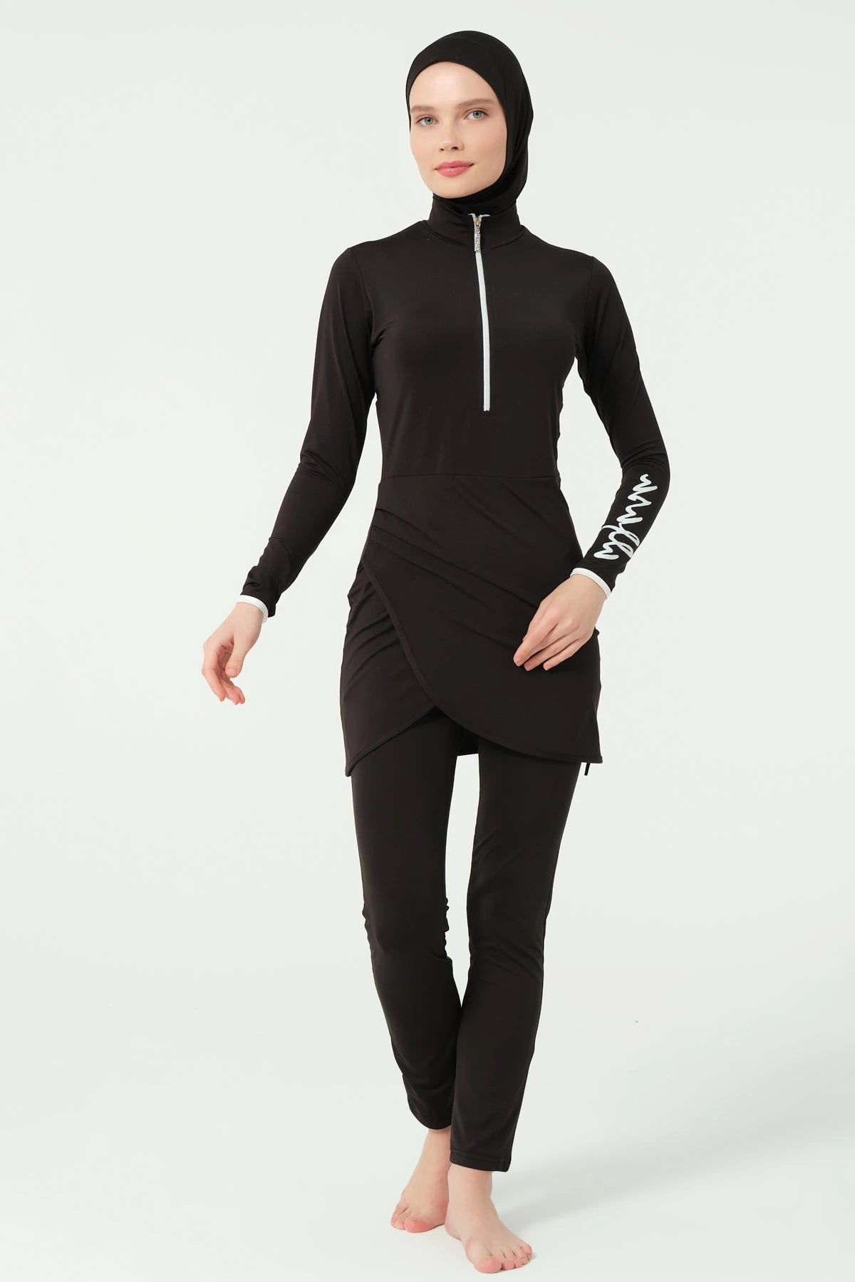 Black burkini set without sarong, front view showing half-zip top