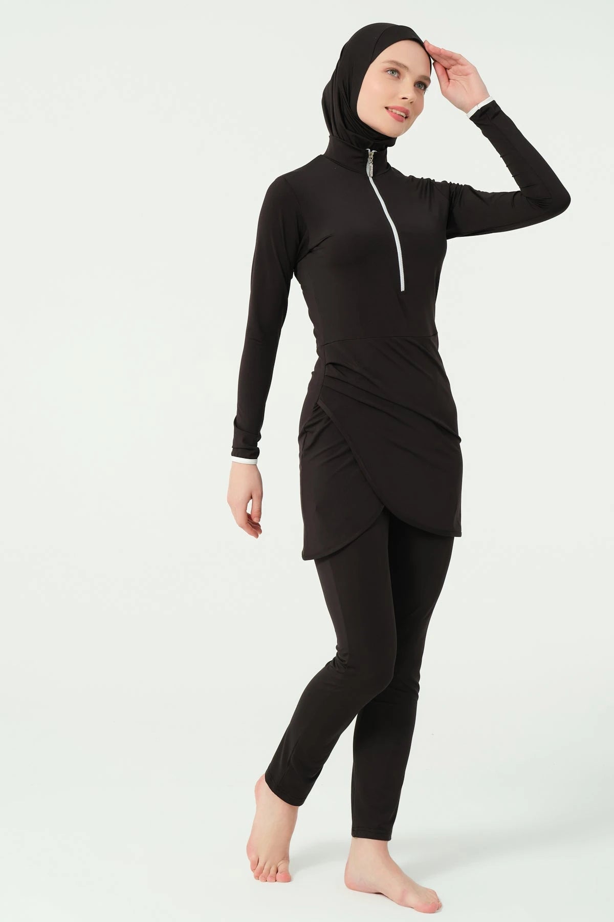 Black burkini set without sarong, side pose showing movement
