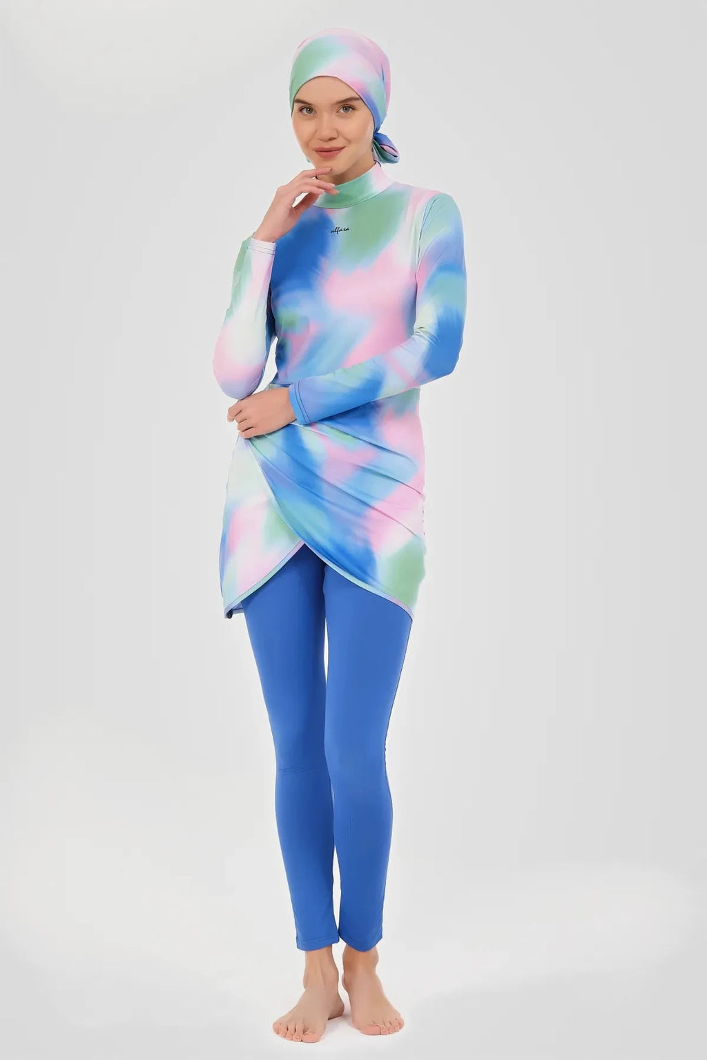 Tie-dye burkini with asymmetrical wrap tunic, front view.