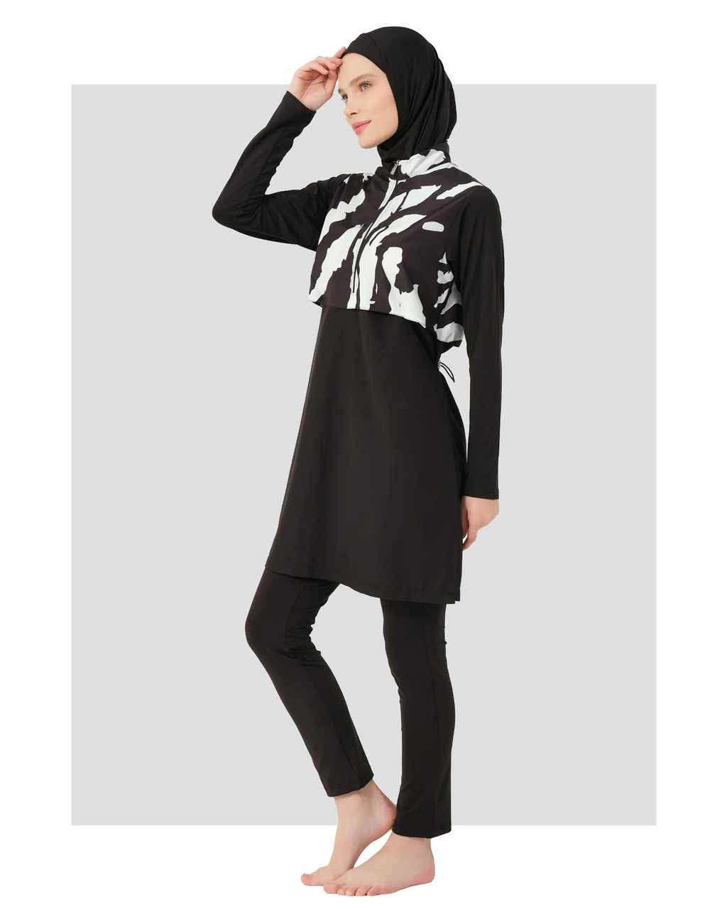 Black and white burkini set side view on light background