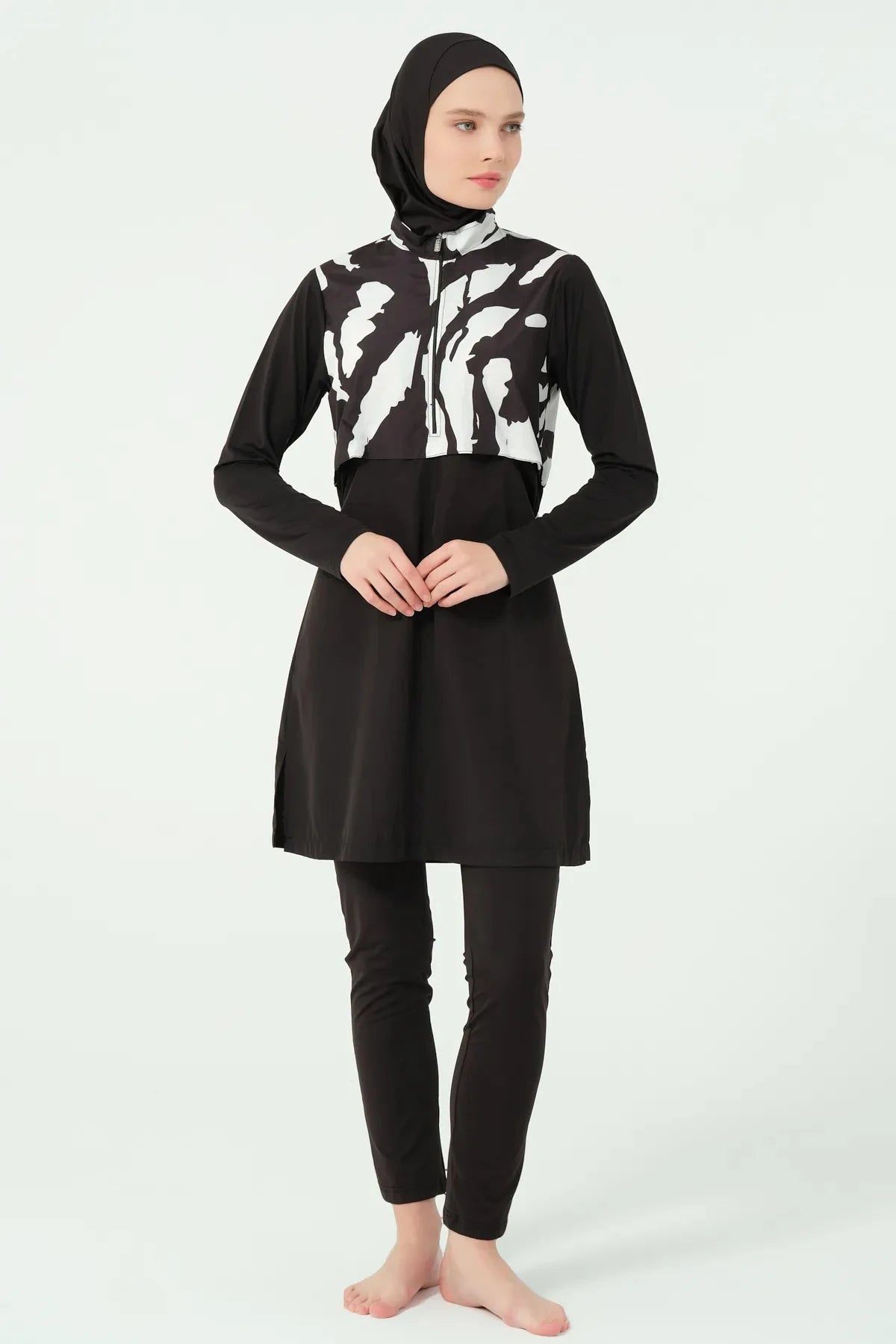 Black and white burkini set front view with half-zip closure