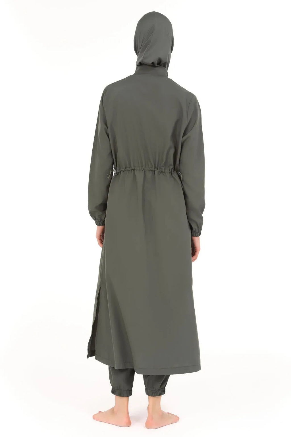 Model wearing olive green full-length burkini with adjustable waist drawstring back view.