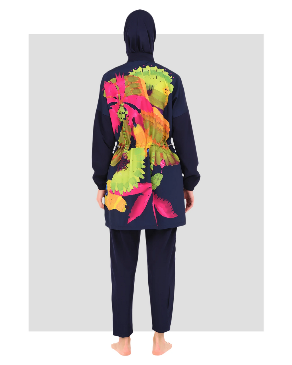 Navy burkini with vibrant floral back design and adjustable waist tie.