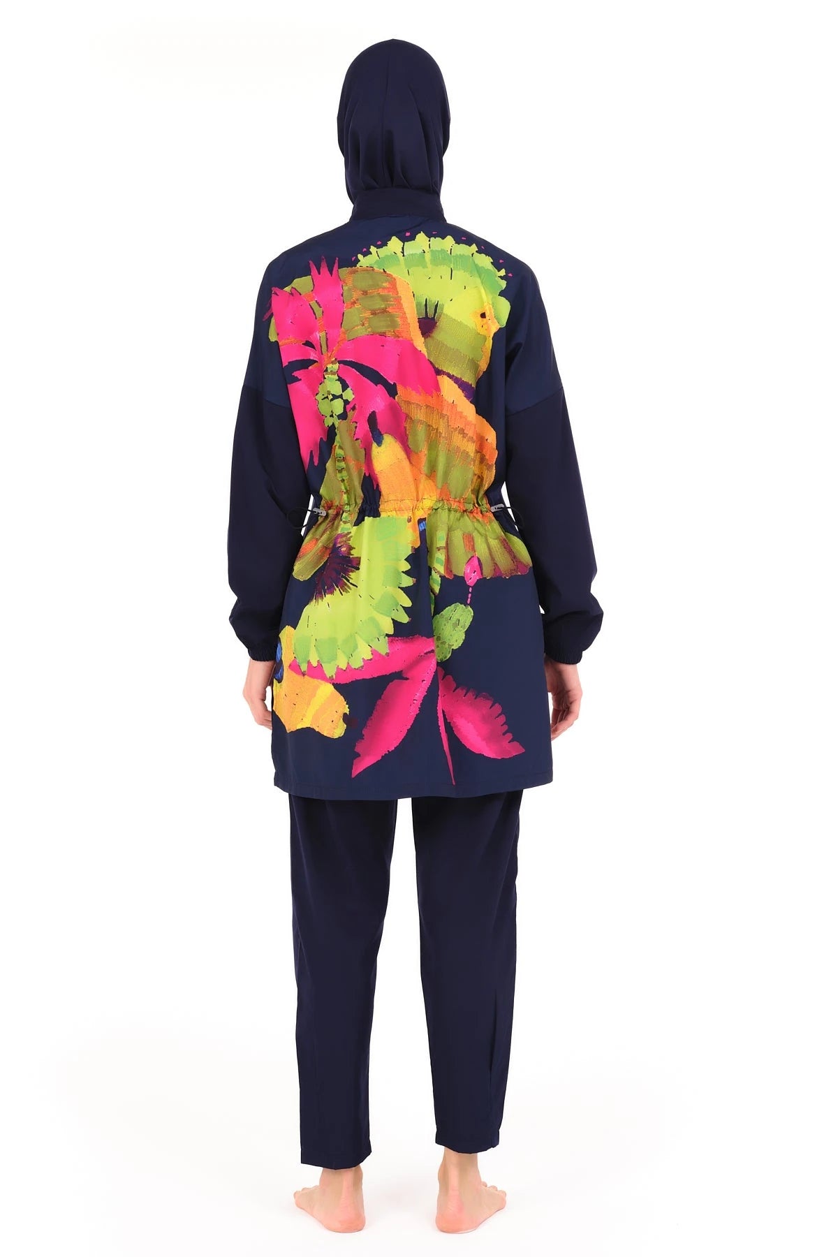 Navy burkini back view showing vibrant floral artwork and waist tie.