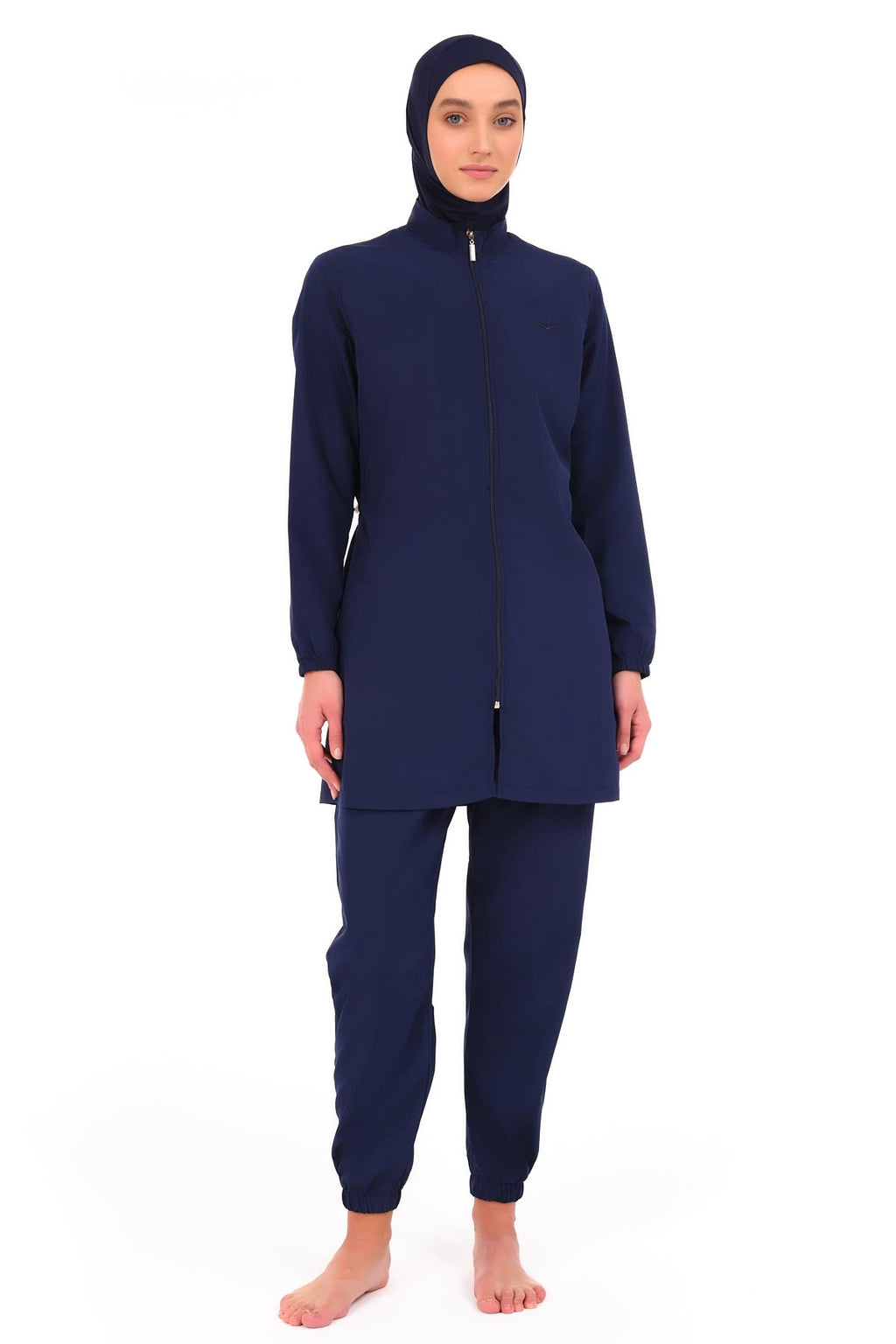 Close-up of navy blue burkini tunic zipper and high neckline.