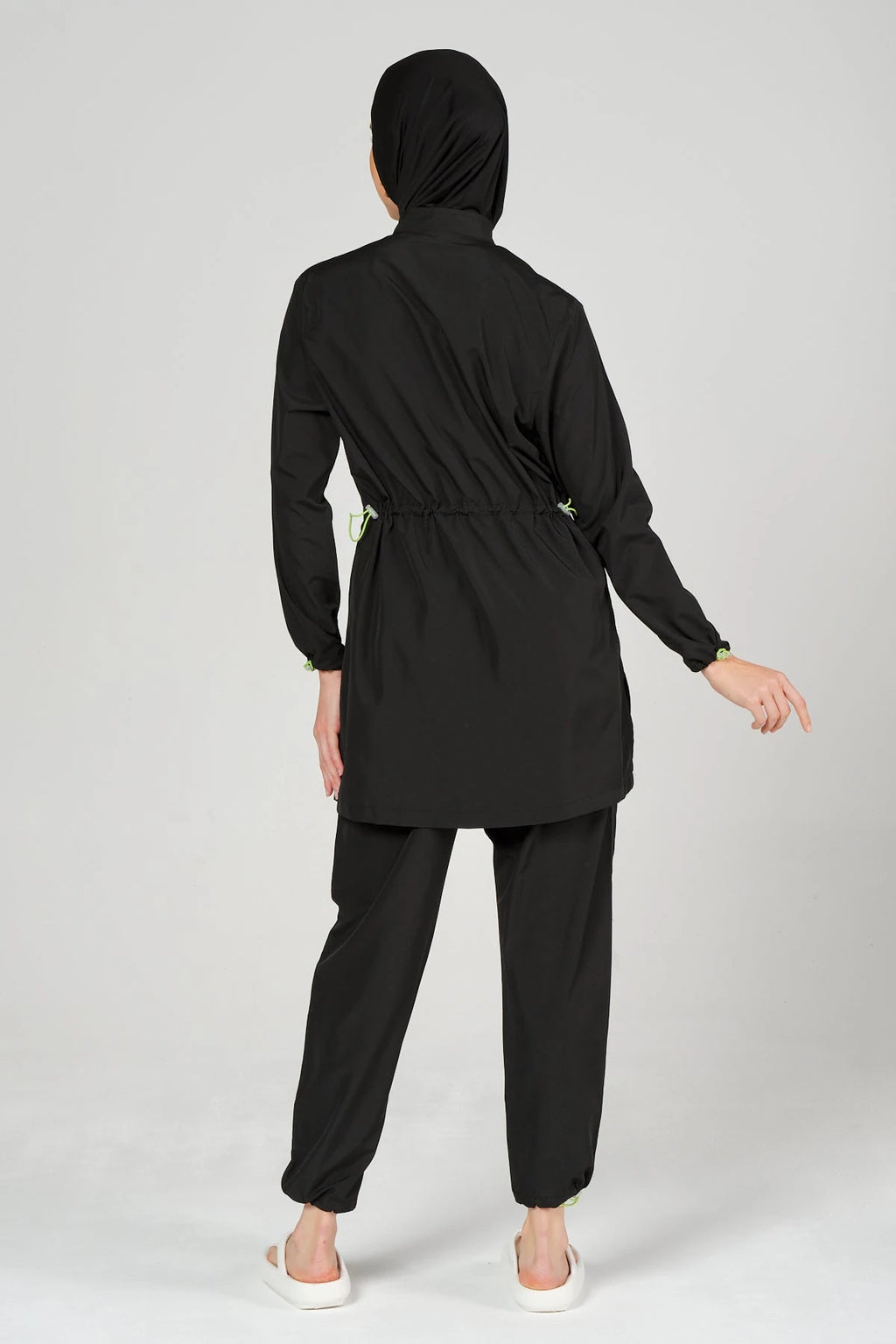 Back view of black burkini set with adjustable drawstring and hijab.