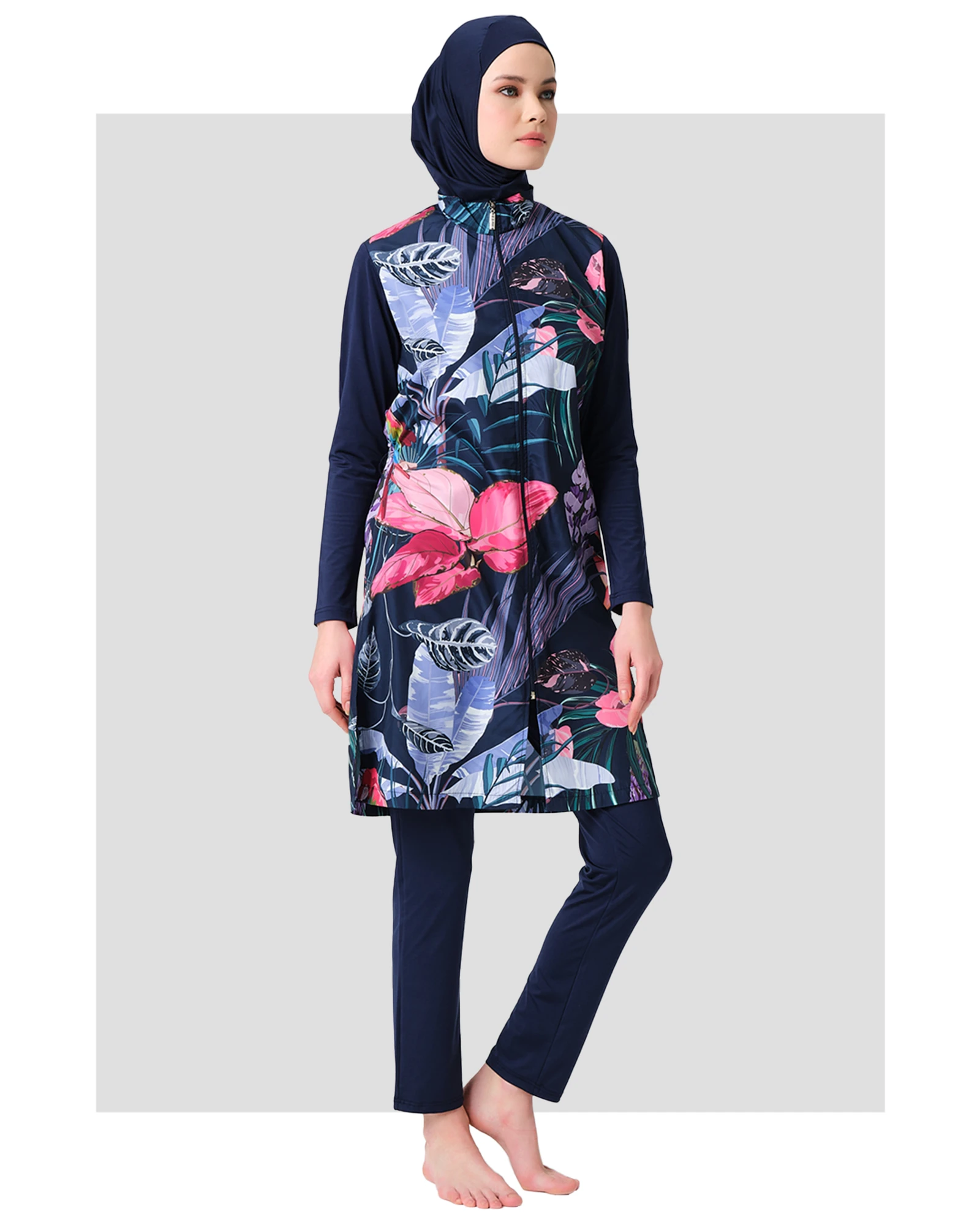 Navy blue burkini with tropical floral print, front zipper, and hijab