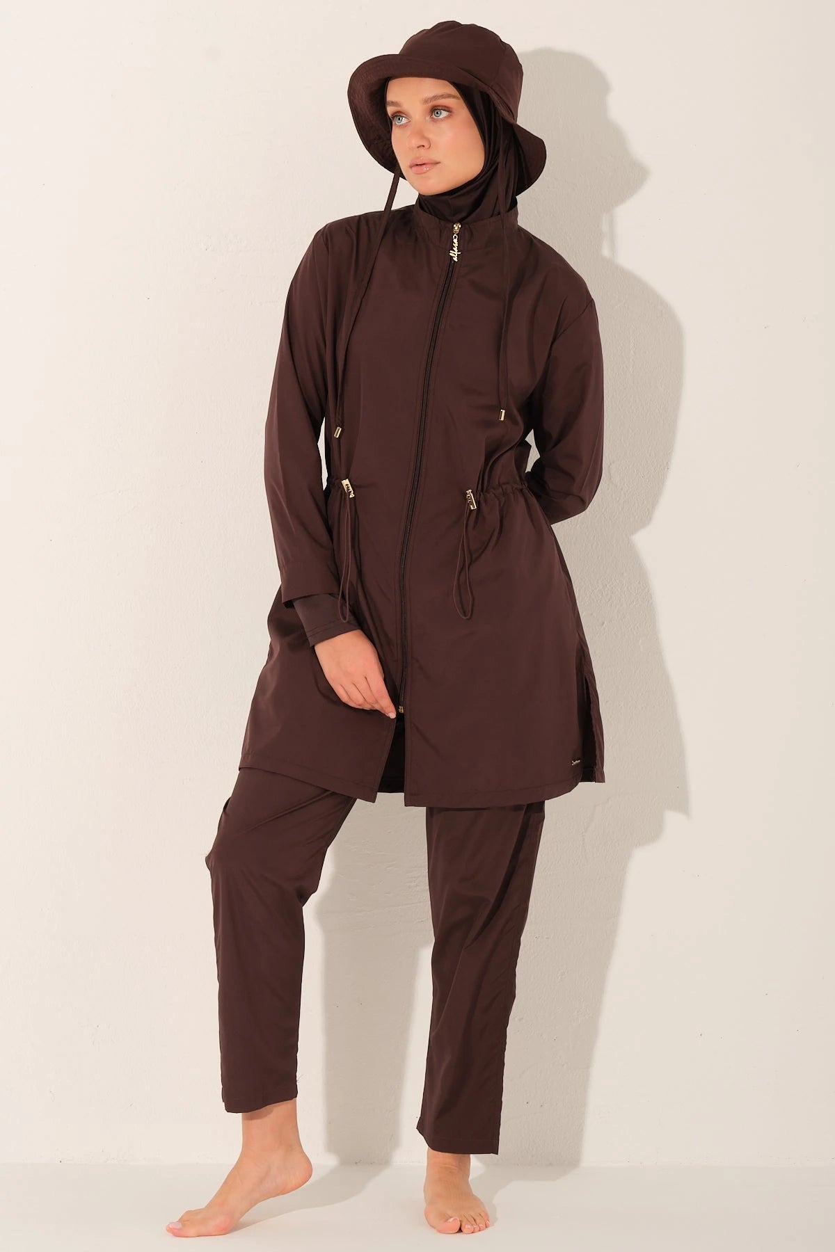 Full mocha burkini swimwear set with hat, angled front view.