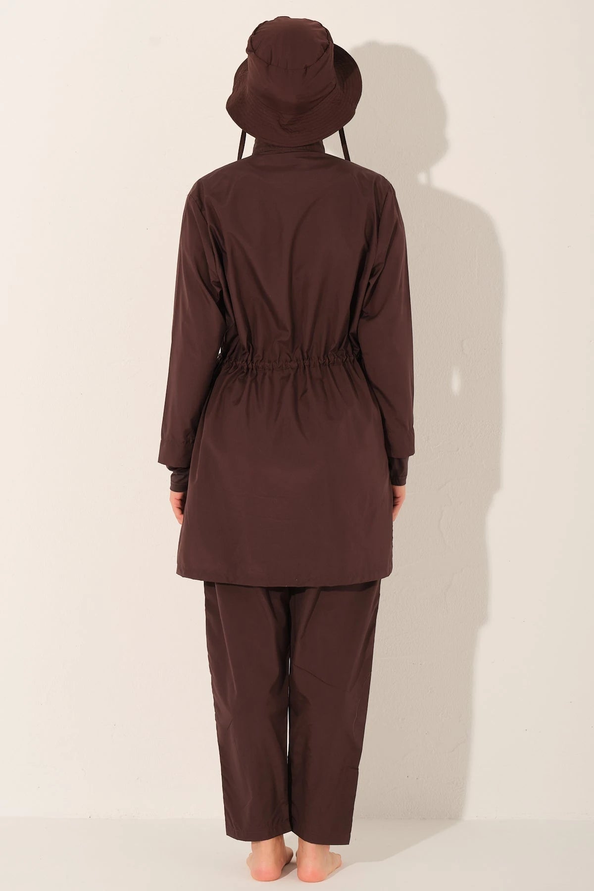 Mocha burkini set with elasticated waist and swim pants, back view.