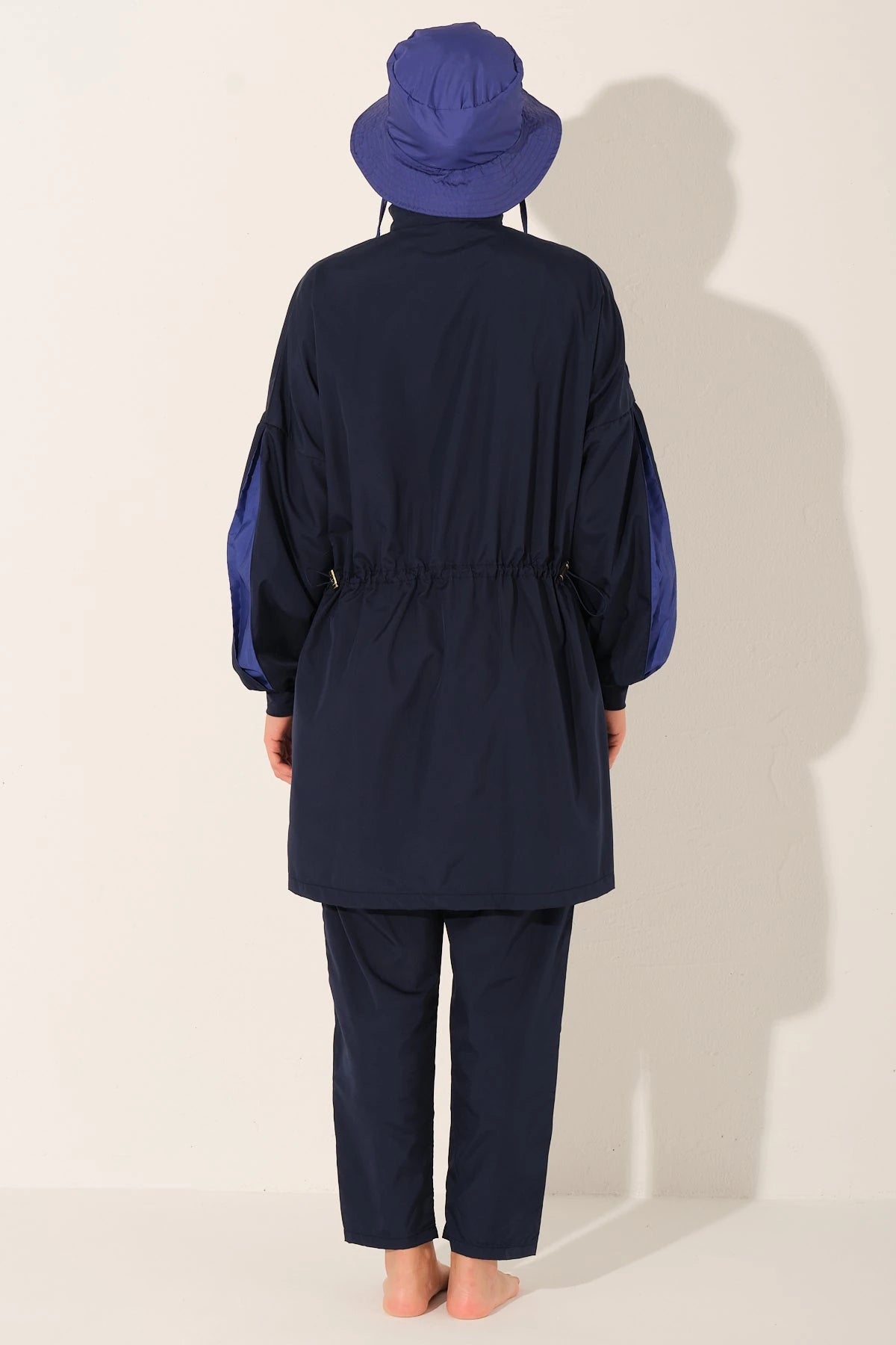 Navy Tide burkini set back view with adjustable waist drawstring