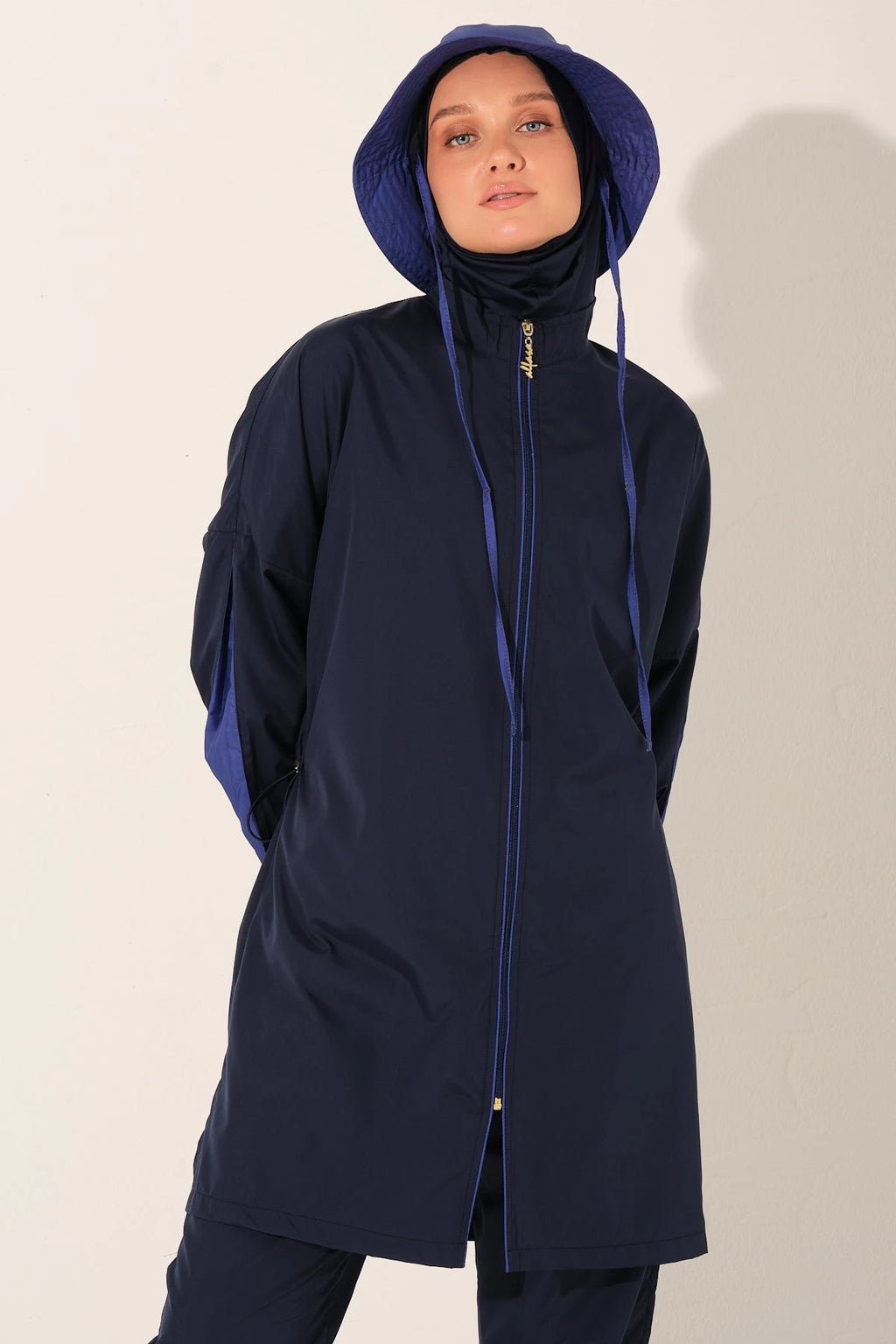 Navy Tide burkini top detail showing zipper and hijab
