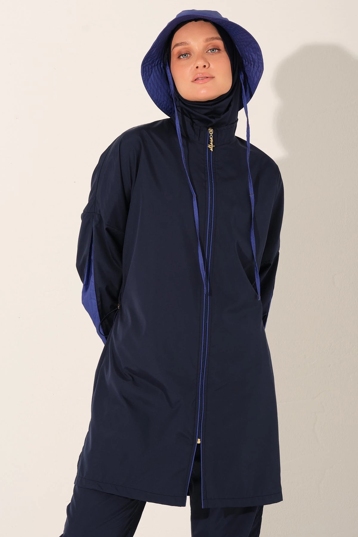 Navy Tide burkini top detail showing zipper and hijab