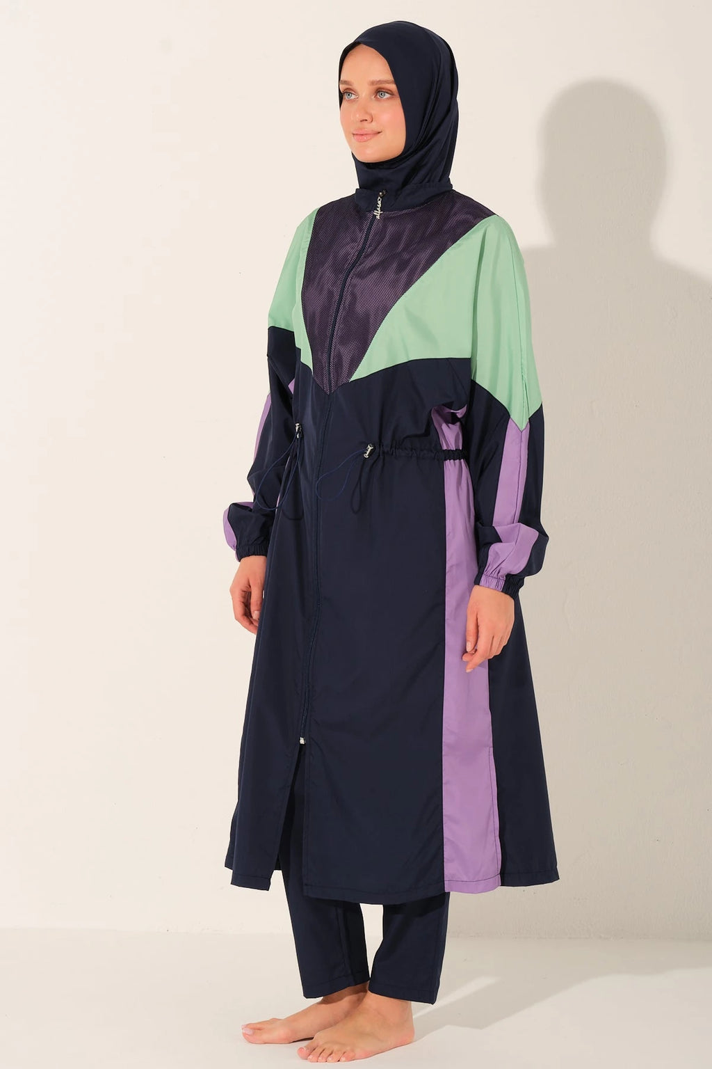 Aurora Pulse multi-color burkini set side view on light background.