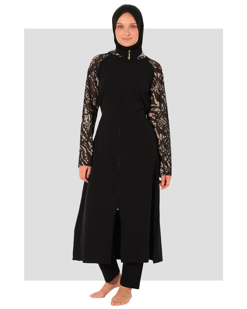 Black burkini set with patterned sleeves and hood, front view.