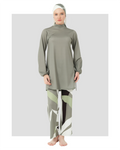 Olive green burkini set with geometric print pants, front view.