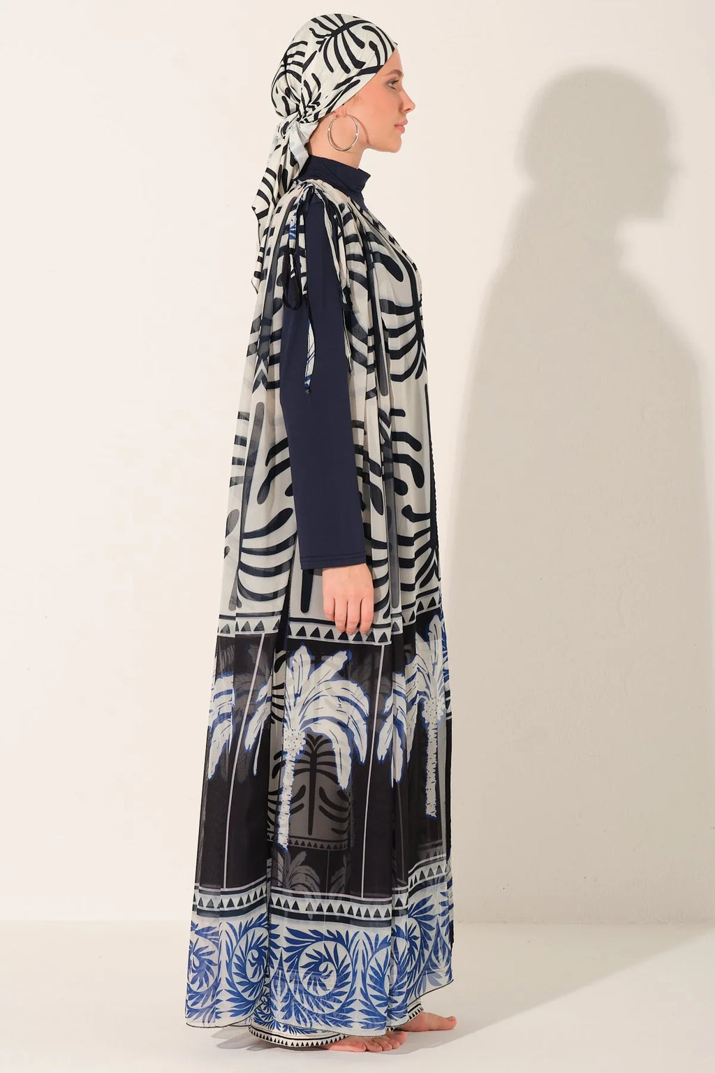 Navy blue burkini set with palm print chiffon kimono side view.