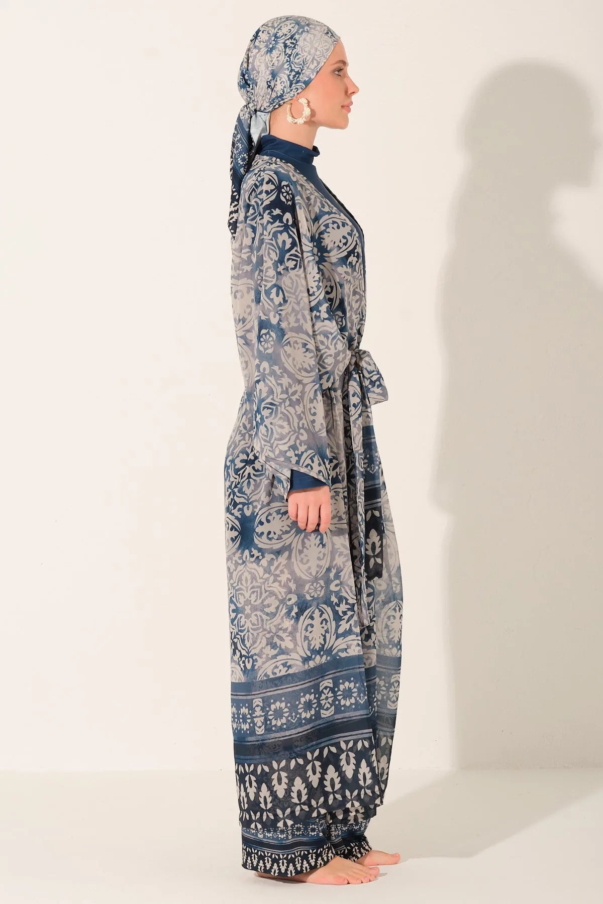 Blue resort burkini set with patterned chiffon kimono side view.