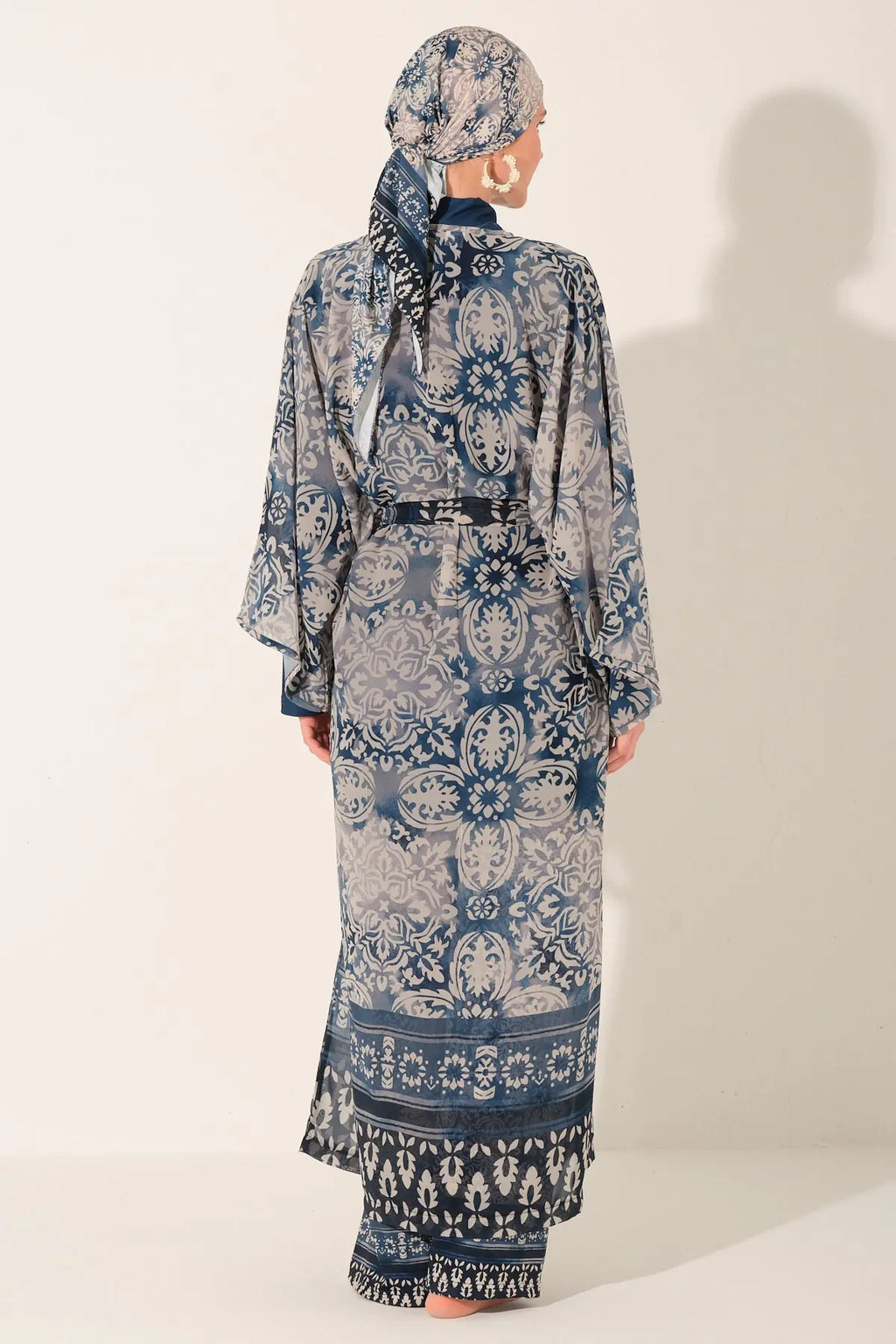 Blue resort burkini set with patterned chiffon kimono back view.