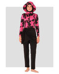 Woman in active floral burkini set with hat, front view.