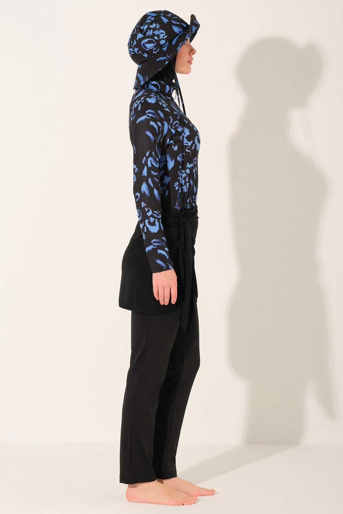 Modest midnight bloom burkini set, side profile on light background.