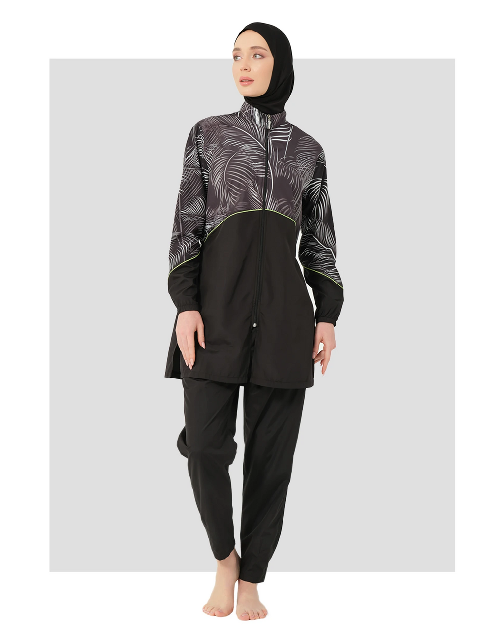 Black palm print burkini set front view on white background.