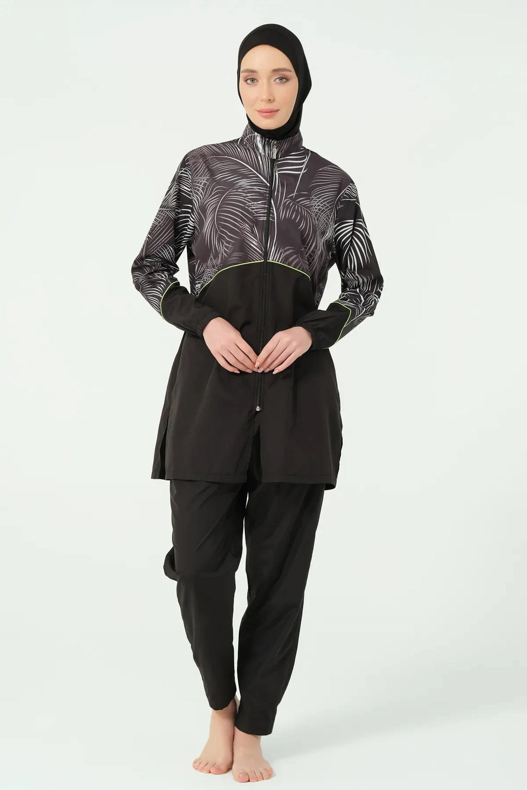 Sporty black burkini set with palm print, full length view.