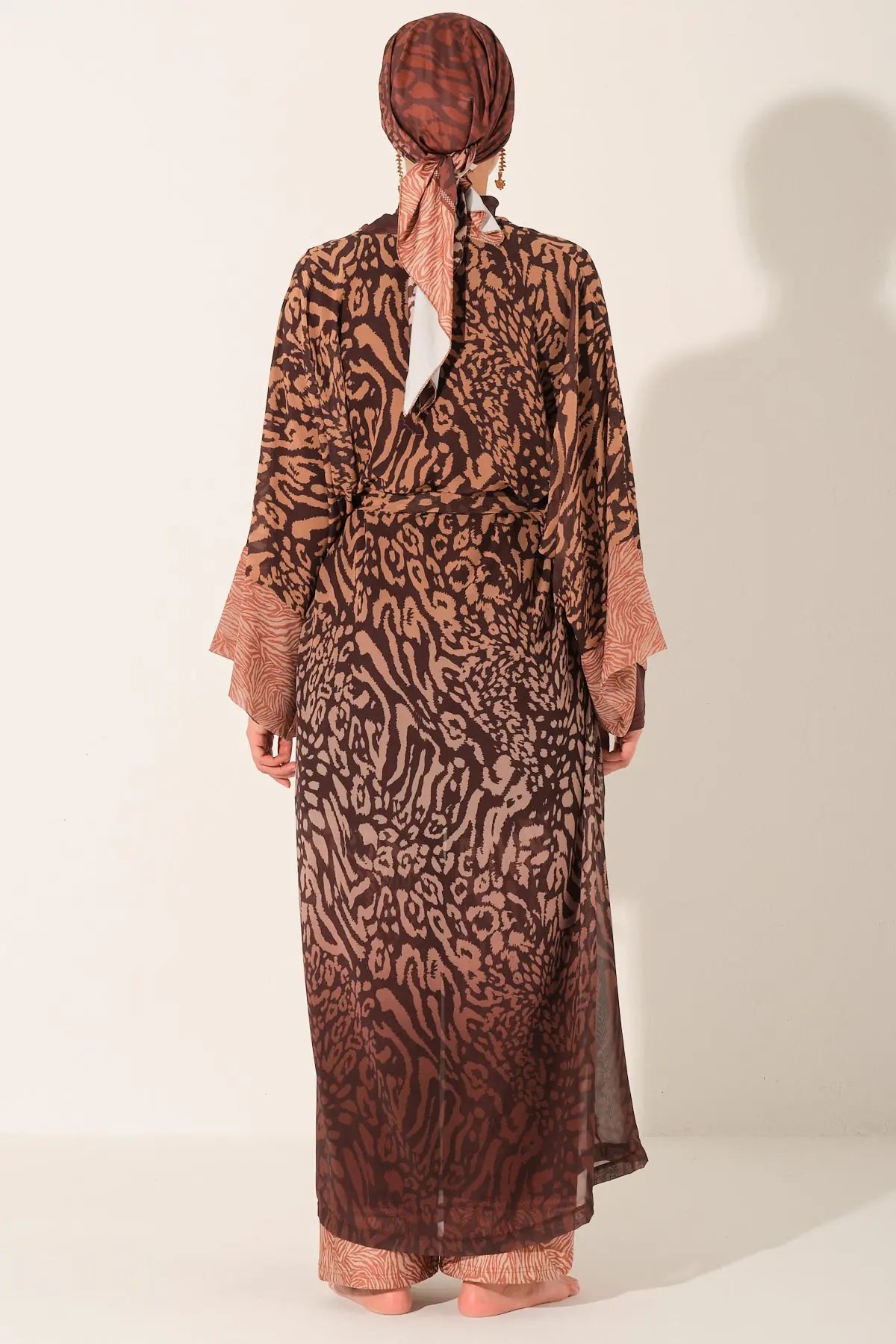 Back view of mocha print burkini with open kimono in studio.