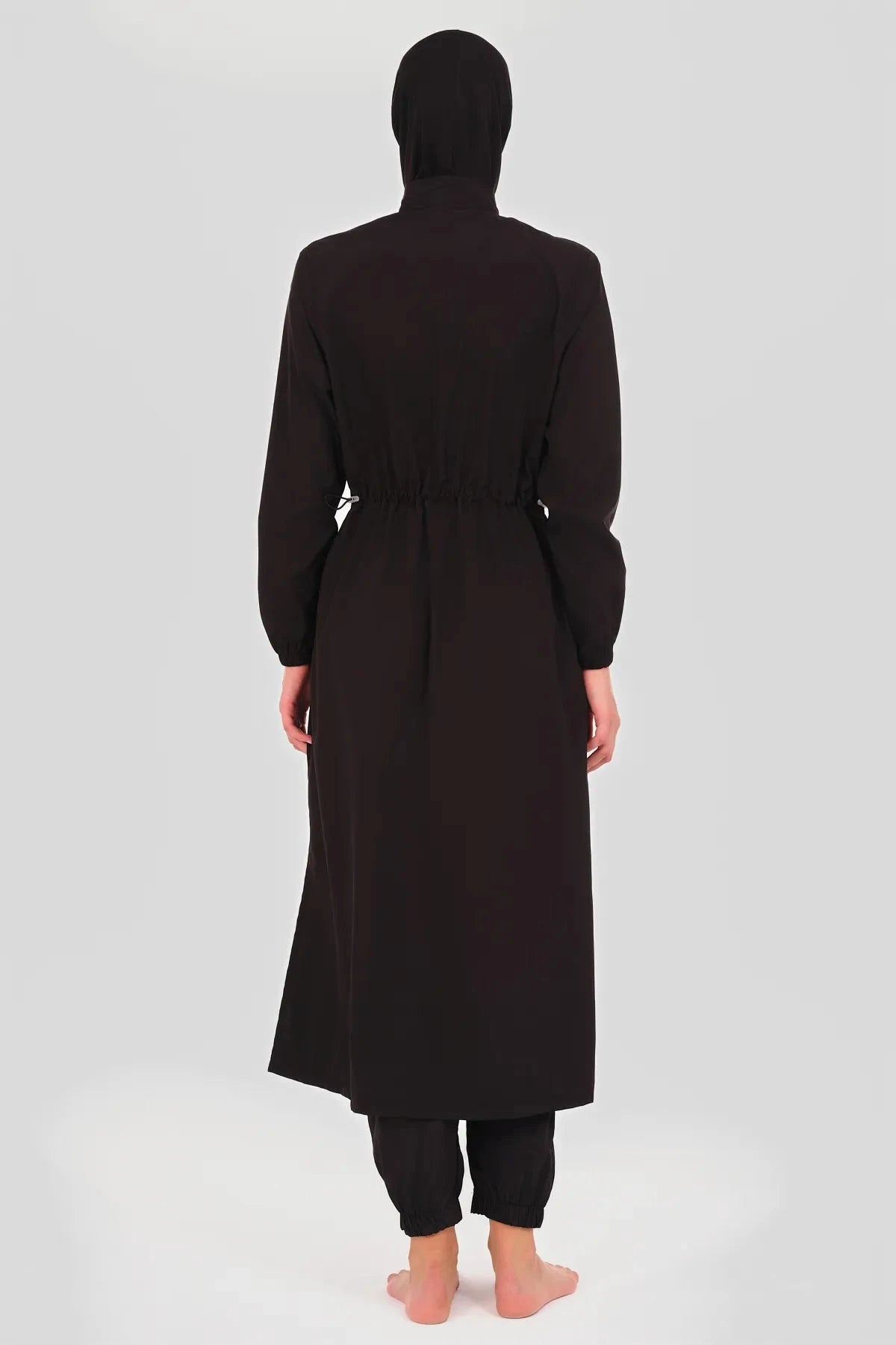 Back view of black burkini with adjustable drawstring waist