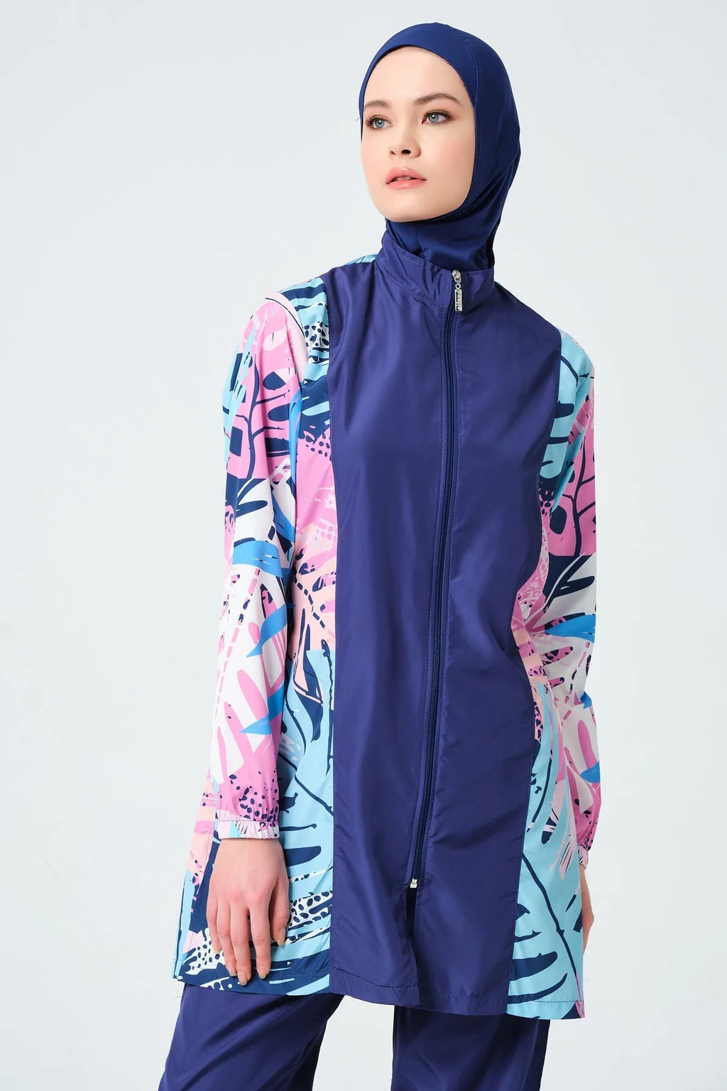 Front angled view of model wearing tropical print burkini.