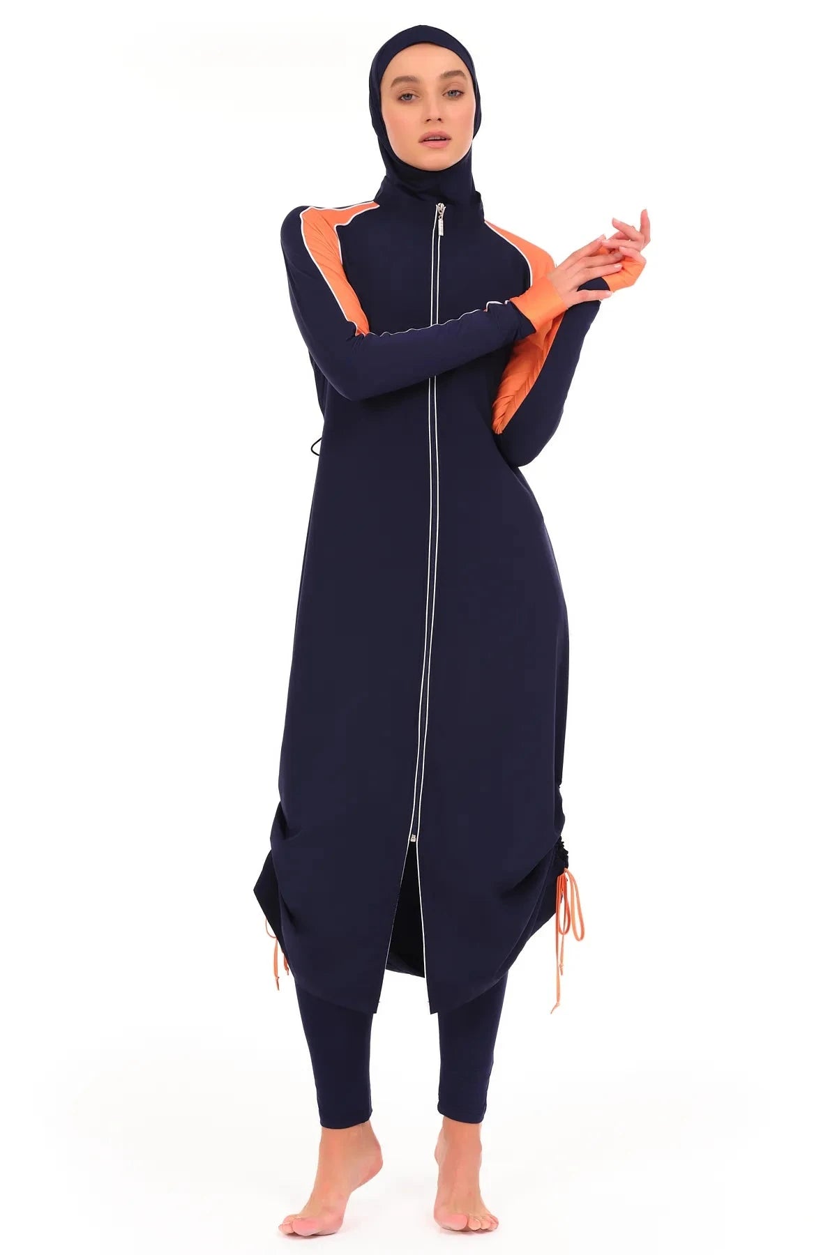 Close-up of navy burkini with orange sleeves, showing zipper detail.