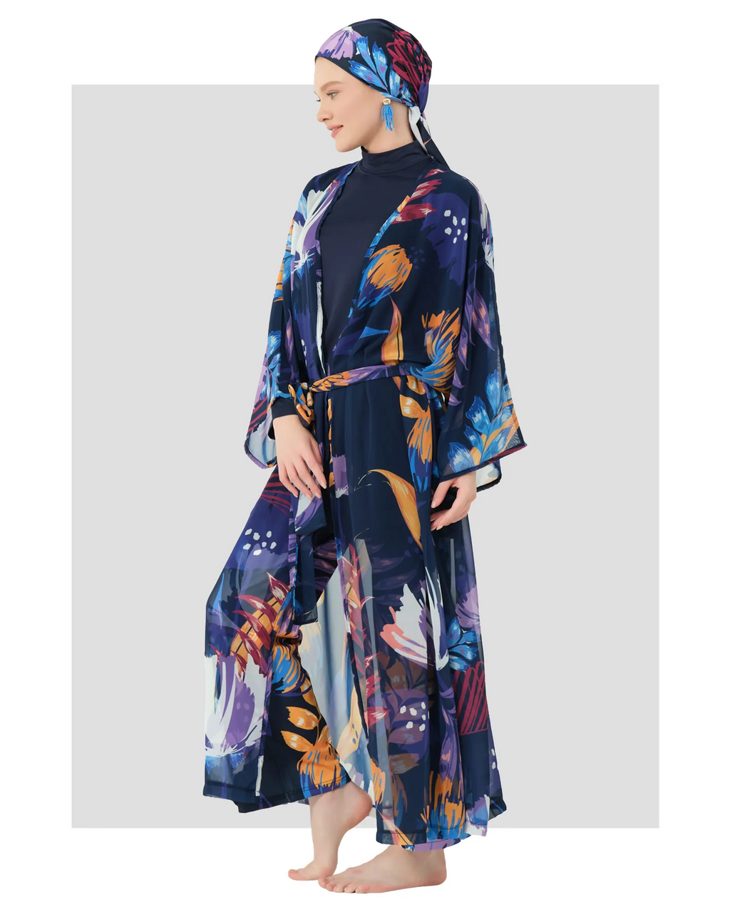 Midnight bloom burkini set with sheer floral kimono, side view.