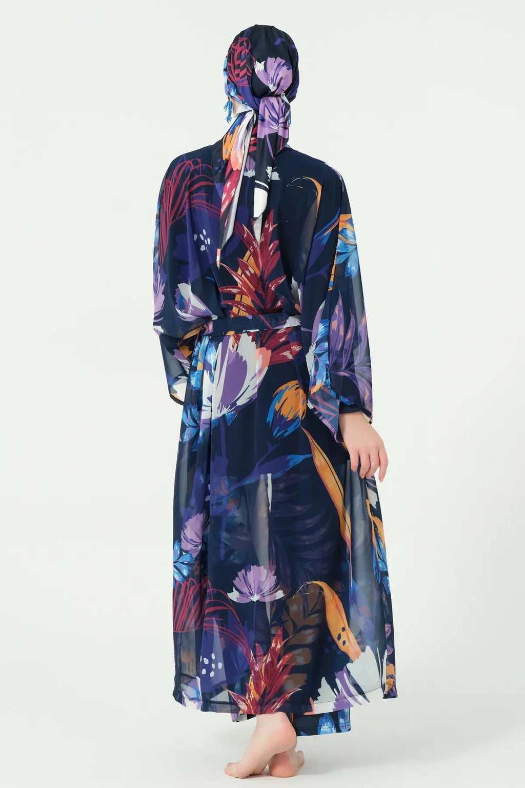 Midnight bloom burkini set with sheer floral kimono, back view.