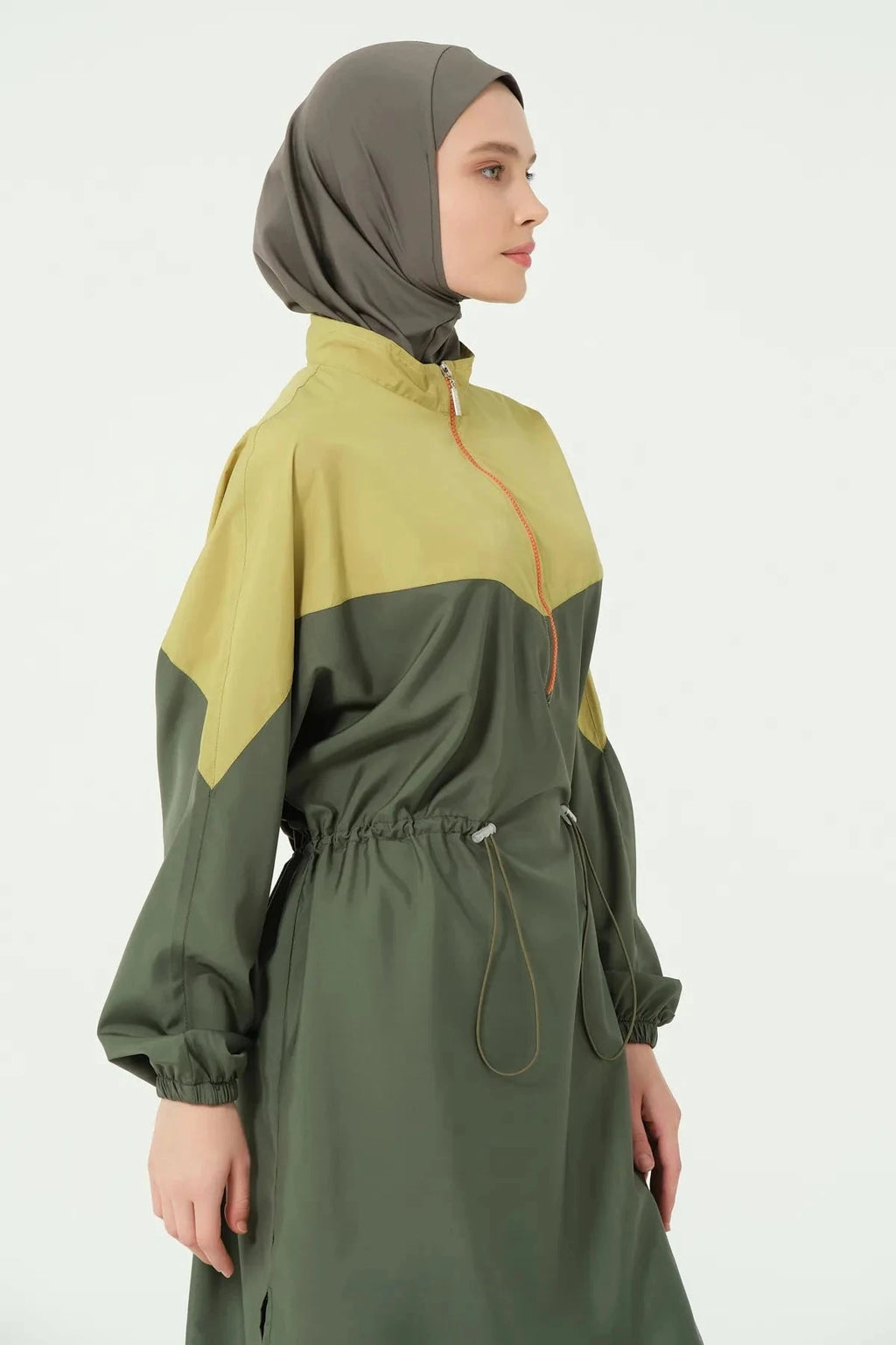 Close-up of olive and mustard burkini set collar with zipper.