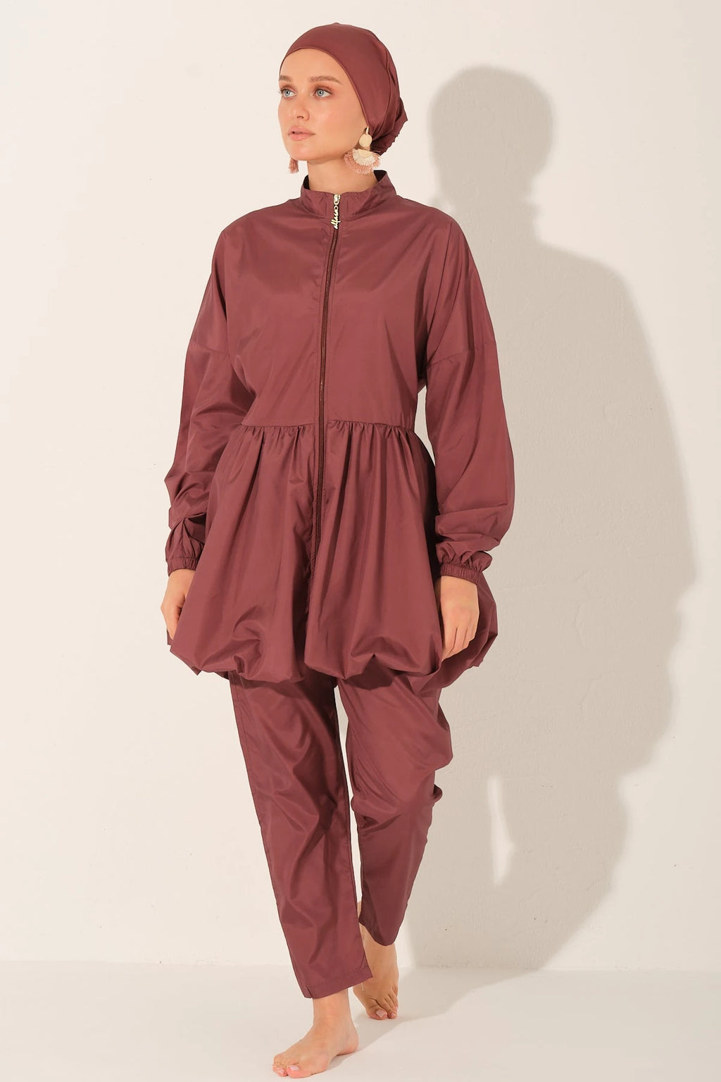 Rosewood burkini set front view on a light beige background.