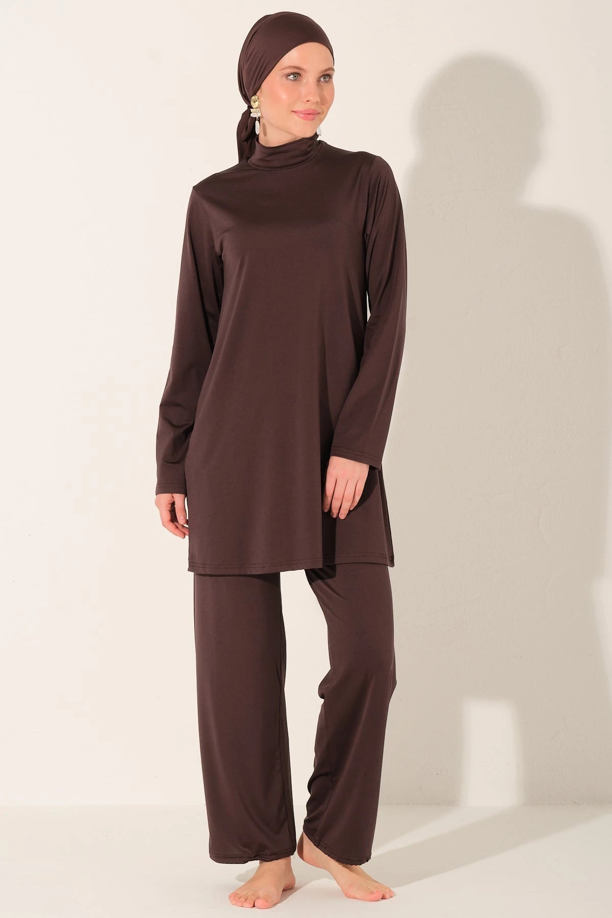 Full length view of mocha burkini set on model.