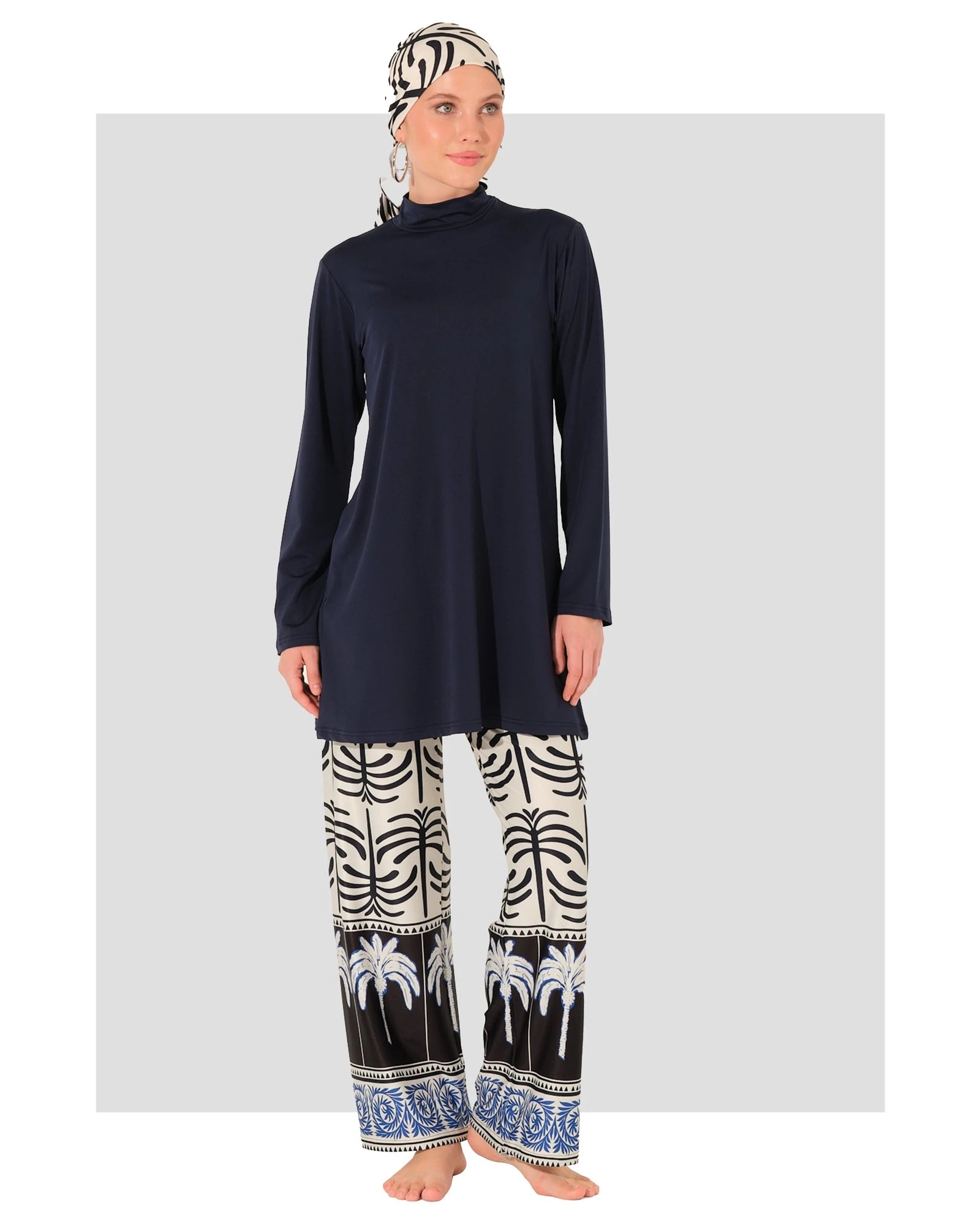 Navy burkini set with patterned swim pants and matching scarf front view.