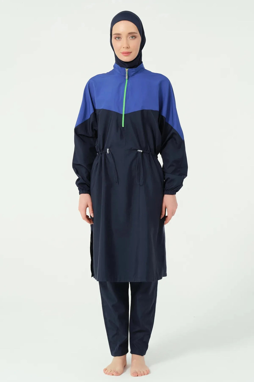 Close-up of navy blue and royal blue burkini top with half-zip detail.