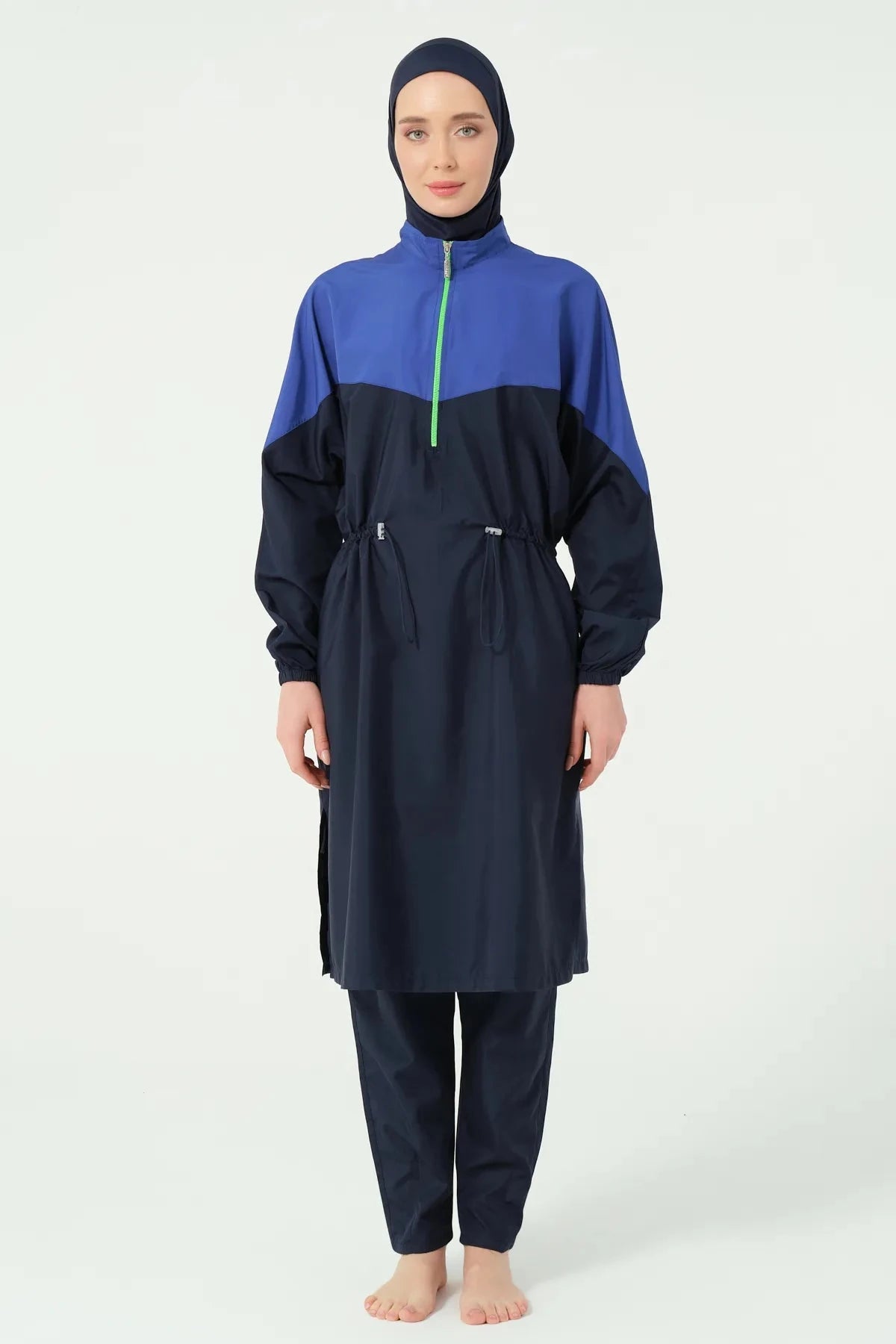 Close-up of navy blue and royal blue burkini top with half-zip detail.