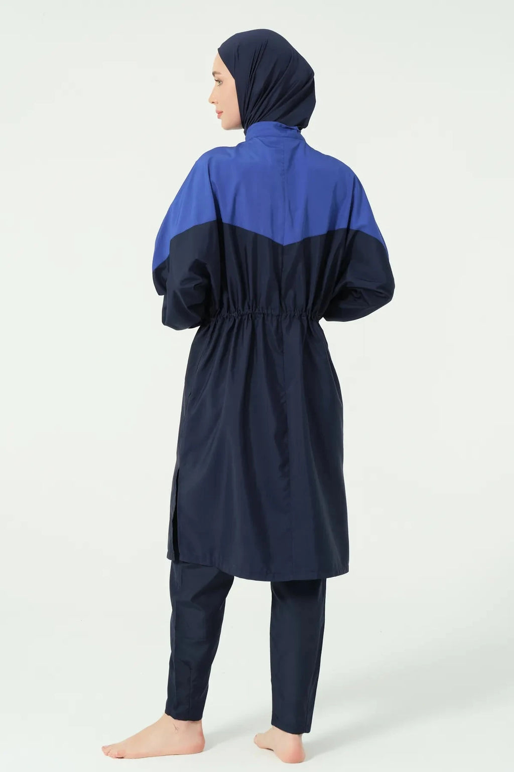 Navy blue and royal blue color-block burkini set, back view with drawstring.