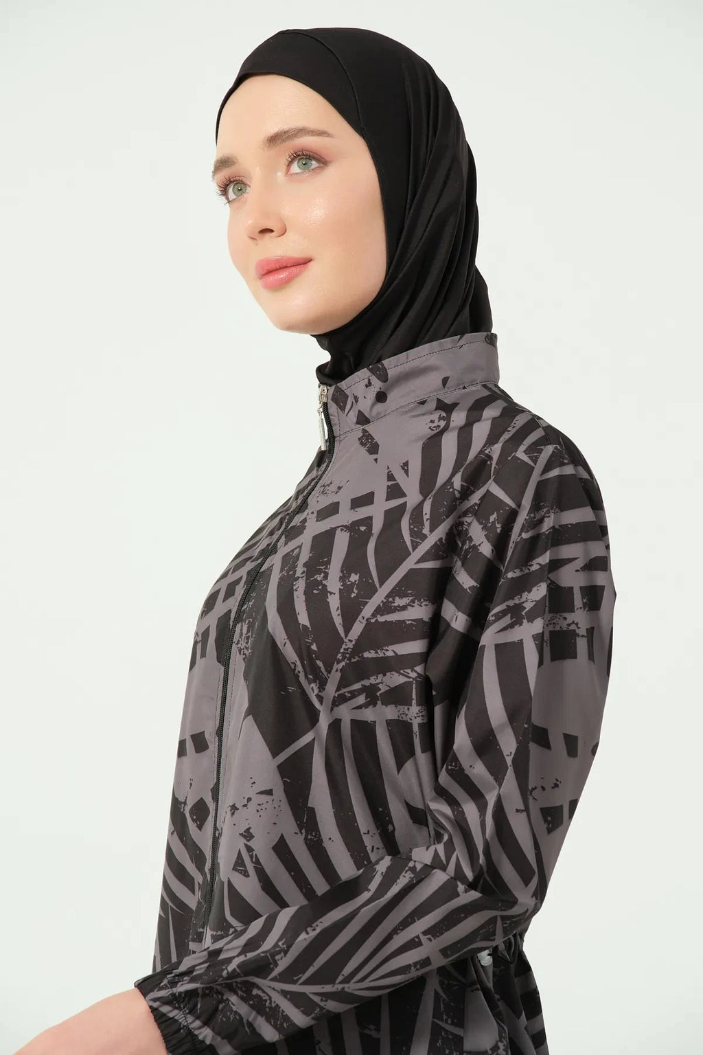 Close-up of the collar and print on a black and grey burkini.