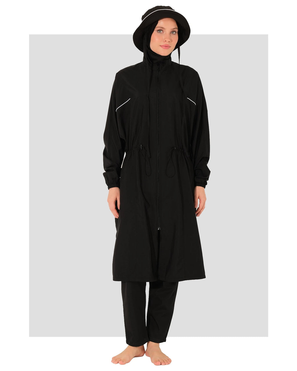 Black burkini set with long top, swim pants, and bucket hat front view.