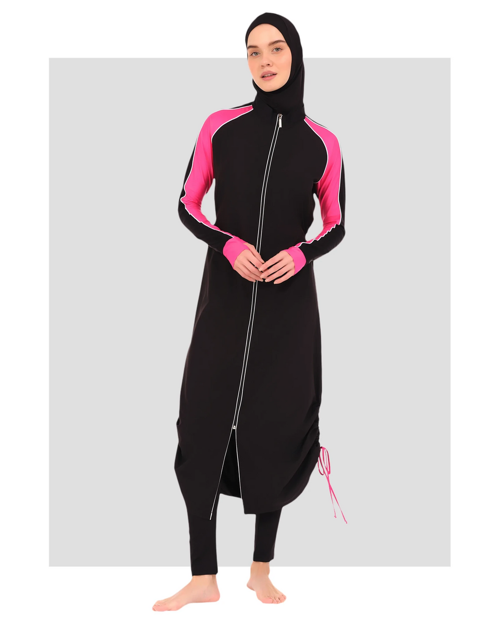 Black burkini with pink sleeves and white piping, front zipper, hijab.