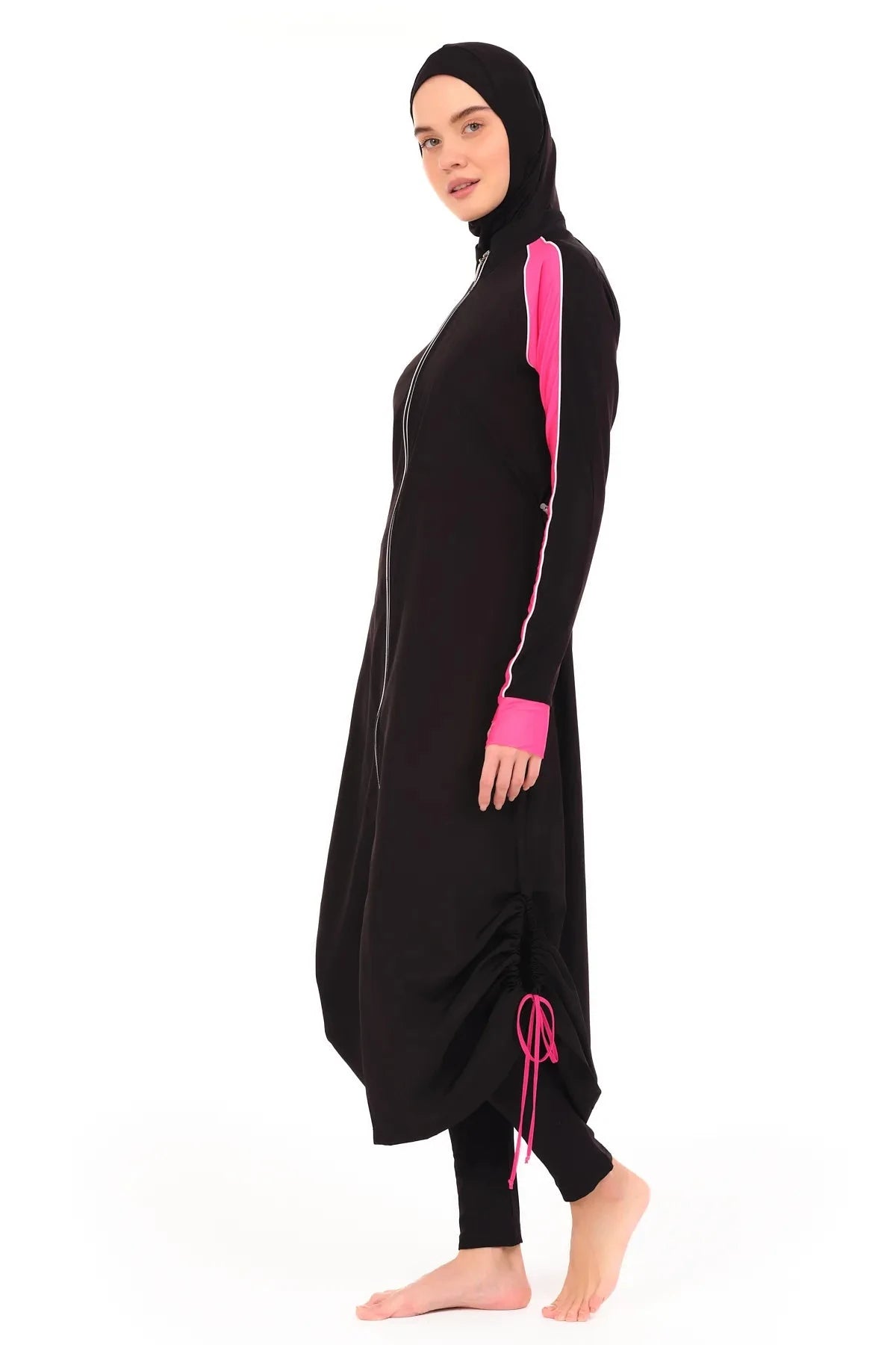 Side view of black burkini with pink sleeves and adjustable hem.