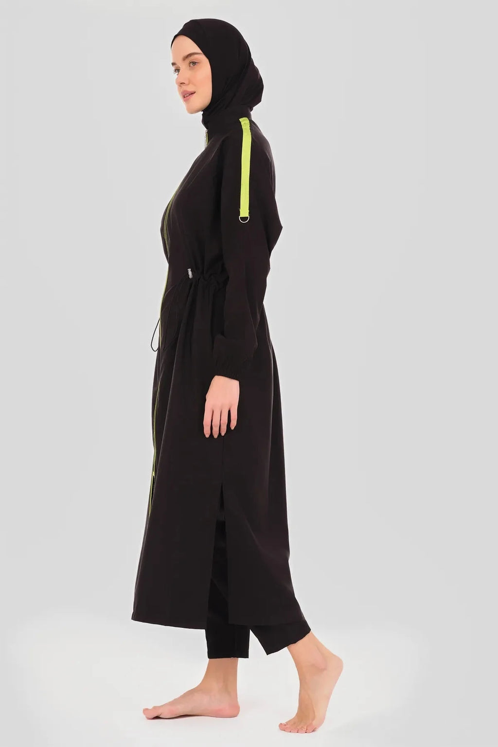 Black burkini jacket with neon green stripe on back, front view.