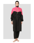 Woman wearing a black and fuchsia burkini with a half-zip high neck and adjustable waist.